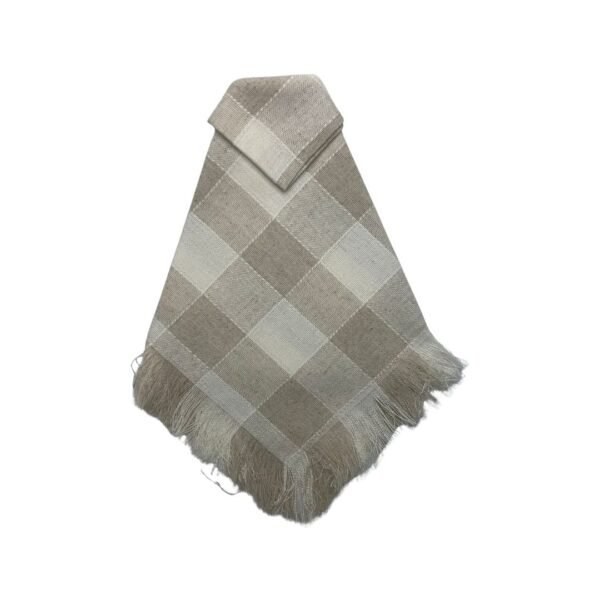 Rustic napkin in beige with gingham pattern.