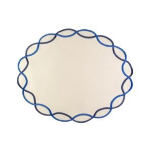 Graceful oval placemat design with intricate blue embroidery.